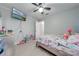 Well-lit bedroom with a bed and a TV, perfect for relaxation at 3160 Santa Cruz Dr, Kissimmee, FL 34746
