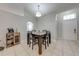 Inviting dining area with modern table, chairs, stylish décor, and neutral color scheme at 3160 Santa Cruz Dr, Kissimmee, FL 34746