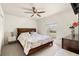 Well-lit bedroom with a ceiling fan and large window at 318 Highland Meadows Dr, Davenport, FL 33837