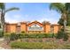 Elegant Highland Meadows community sign surrounded by lush landscaping at 318 Highland Meadows Dr, Davenport, FL 33837