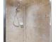 A full view of the tiled shower and shower head at 318 Highland Meadows Dr, Davenport, FL 33837
