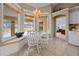 Inviting breakfast nook with pool views and cozy bench seating at 3256 Countryside View Dr, St Cloud, FL 34772