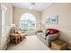 Cozy living area with comfortable seating and a large window for natural light at 3256 Countryside View Dr, St Cloud, FL 34772