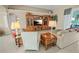 Cozy living room with built-in entertainment center and comfortable seating at 3256 Countryside View Dr, St Cloud, FL 34772
