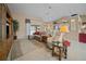 Bright living room with comfortable seating, neutral decor, and sliding glass doors to the outside at 3256 Countryside View Dr, St Cloud, FL 34772