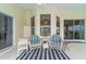 Relaxing outdoor patio with comfortable seating and a view of lush greenery at 3256 Countryside View Dr, St Cloud, FL 34772