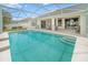 Enjoy the large screened-in pool and patio area, with views of the well-maintained backyard at 3256 Countryside View Dr, St Cloud, FL 34772