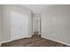 Bedroom with wood flooring and double door closet at 3366 Puxton Dr, Orlando, FL 32824