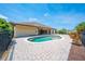 A sunny backyard featuring a fenced pool area and a brick-paved patio, perfect for relaxation and outdoor enjoyment at 3551 Buckingham Ct, St Cloud, FL 34772