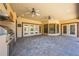 Spacious covered patio with brick pavers, ceiling fans, and multiple access points to the home at 3551 Buckingham Ct, St Cloud, FL 34772