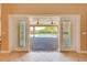 Covered patio with pavers overlooking a pool and backyard oasis at 3551 Buckingham Ct, St Cloud, FL 34772