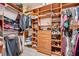Well-organized walk-in closet with shelving, drawers, and ample storage space at 3551 Buckingham Ct, St Cloud, FL 34772