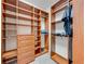 Spacious walk-in closet featuring custom shelving and plenty of room for storage at 3551 Buckingham Ct, St Cloud, FL 34772