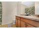 Neutral bathroom featuring a shower, modern fixtures, and vanity with storage at 3881 Wind Dancer Cir, St Cloud, FL 34772