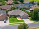 A lovely house with a manicured lawn and landscaping situated in a verdant neighborhood at 404 N Sundance Dr, Lake Mary, FL 32746