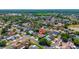 Aerial view showcasing the neighborhood and the home's location with mature trees at 404 N Sundance Dr, Lake Mary, FL 32746