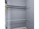 A light gray walk in closet with rods for hanging clothes at 404 N Sundance Dr, Lake Mary, FL 32746