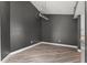 Dining area features wood flooring, a modern light fixture, and neutral wall paint at 404 N Sundance Dr, Lake Mary, FL 32746