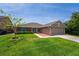 Charming single-story home with a well-manicured lawn and a two-car garage at 404 N Sundance Dr, Lake Mary, FL 32746