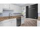 Kitchen featuring stainless steel appliances, granite countertops and ample cabinet space at 404 N Sundance Dr, Lake Mary, FL 32746