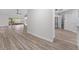 Open-concept living area with hardwood floors and plenty of natural light at 404 N Sundance Dr, Lake Mary, FL 32746