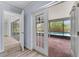 Enclosed patio with brick floor leading to a screened-in pool and lush landscaping at 404 N Sundance Dr, Lake Mary, FL 32746