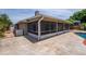 Spacious screened-in lanai with direct access to the pool and backyard at 404 N Sundance Dr, Lake Mary, FL 32746