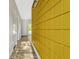 Hallway with wood-look floors and an accent wall leading to the outdoors at 407 S Lakemont Ave, Winter Park, FL 32792