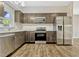 Kitchen with stainless appliances, and countertops for a modern look at 407 S Lakemont Ave, Winter Park, FL 32792