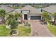 Well-manicured home with manicured landscaping at 433 Via Abruzzi St, Kissimmee, FL 34759