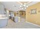 Open-concept kitchen, featuring a large island, modern appliances, and access to multiple living spaces at 433 Via Abruzzi St, Kissimmee, FL 34759