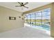 Enclosed pool area overlooks serene water view at 433 Via Abruzzi St, Kissimmee, FL 34759