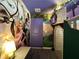Custom-designed bedroom with stone accents, bunk beds, murals, and decorative details at 4473 Kaipo Rd, Davenport, FL 33897