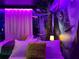 Uniquely decorated Avatar-themed bedroom featuring artistic decor and ambient lighting at 4473 Kaipo Rd, Davenport, FL 33897
