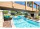 Relax in the tranquil lazy river, complete with gentle waterfalls and lush landscaping at 4473 Kaipo Rd, Davenport, FL 33897