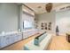 Comfortable lounge area with contemporary furnishings and decorative lighting at 4473 Kaipo Rd, Davenport, FL 33897
