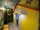Indoor playhouse adds unique character to the room and is an ideal play space at 4473 Kaipo Rd, Davenport, FL 33897