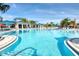 Spacious pool area offers ample room for recreation and relaxation under clear skies at 4473 Kaipo Rd, Davenport, FL 33897