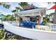 The outdoor bar area is equipped with seating and offers refreshments in a vibrant poolside setting at 4473 Kaipo Rd, Davenport, FL 33897