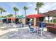 Cabanas offer comfortable seating and privacy, enhancing the luxurious pool experience for residents at 4473 Kaipo Rd, Davenport, FL 33897