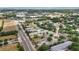 Aerial view of condo complex showing proximity to Neptune and Old Canoe Creek Roads at 4722 Kilt Ct # 65, St Cloud, FL 34769