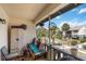 Relaxing condo balcony with seating and views of mature landscaping at 4722 Kilt Ct # 65, St Cloud, FL 34769