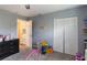 room with closet, dresser and open doorway to another room at 4722 Kilt Ct # 65, St Cloud, FL 34769