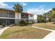 Charming condo exterior with lush landscaping and a private balcony at 4722 Kilt Ct # 65, St Cloud, FL 34769