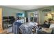 Open living room featuring outdoor patio access and neutral paint at 4722 Kilt Ct # 65, St Cloud, FL 34769