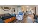 Cozy living room with hardwood floors and dining space at 4722 Kilt Ct # 65, St Cloud, FL 34769