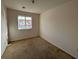 Bedroom featuring a window view of neighborhood houses at 4726 Hemingway House St, Kissimmee, FL 34746
