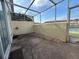 Enclosed patio offering a private outdoor space with views of the surrounding neighborhood at 4726 Hemingway House St, Kissimmee, FL 34746