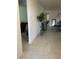 Inviting entryway featuring neutral tile floors and an open view into the dining and living areas at 505 Peace Way, Poinciana, FL 34759