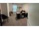 A functional home office featuring a work desk, chair, and natural light from the window, creating a productive atmosphere at 505 Peace Way, Poinciana, FL 34759